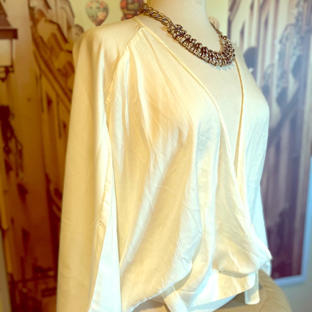 Silky white flowy blouse with wrap waist